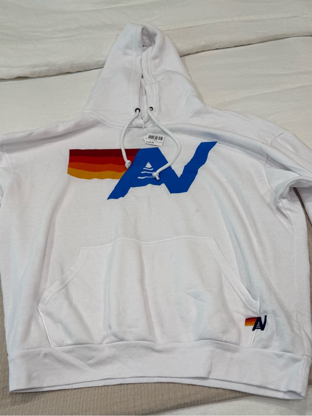 Aviator Nation White Hoodie with Blue Logo and Red-Orange-Yellow Stripe